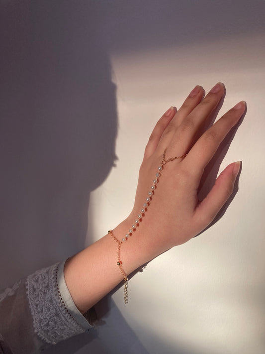 Gold hand chain with pearls - dainty bracelet with ring